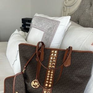 It is used but in good condition, it is ideal for traveling or a night out.